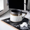 Kaffeetasse mit Henkel, Milchfrühstück, kreatives Heimbüro
